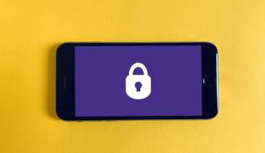 Smartphone displaying a padlock icon, representing mobile device security, data protection, and cybersecurity measures for apps and personal information.